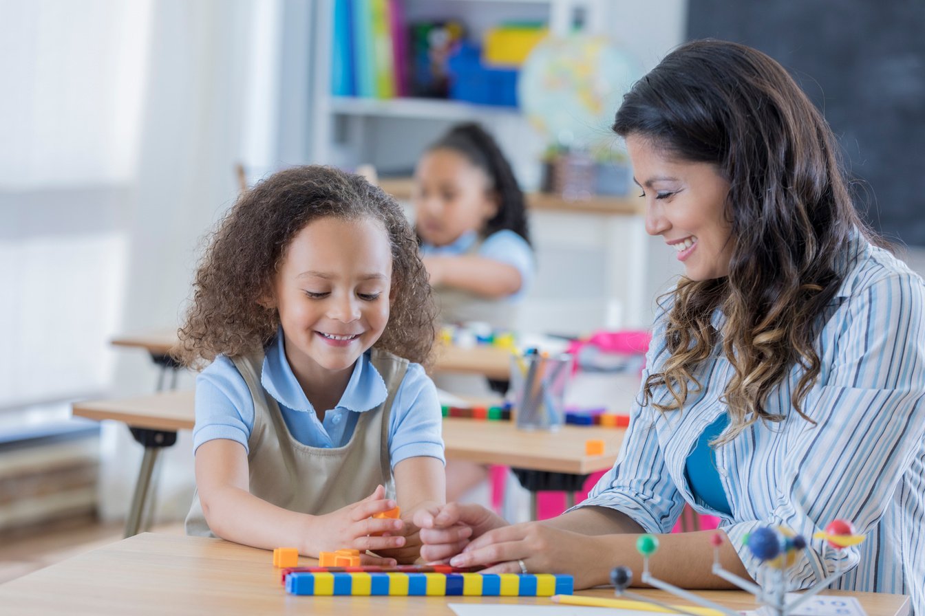 Young student learns math at preschool